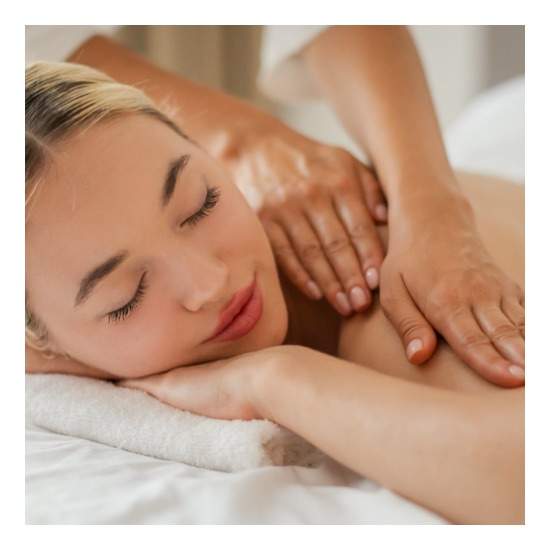 woman in a deep realxed state while having shoulders massaged